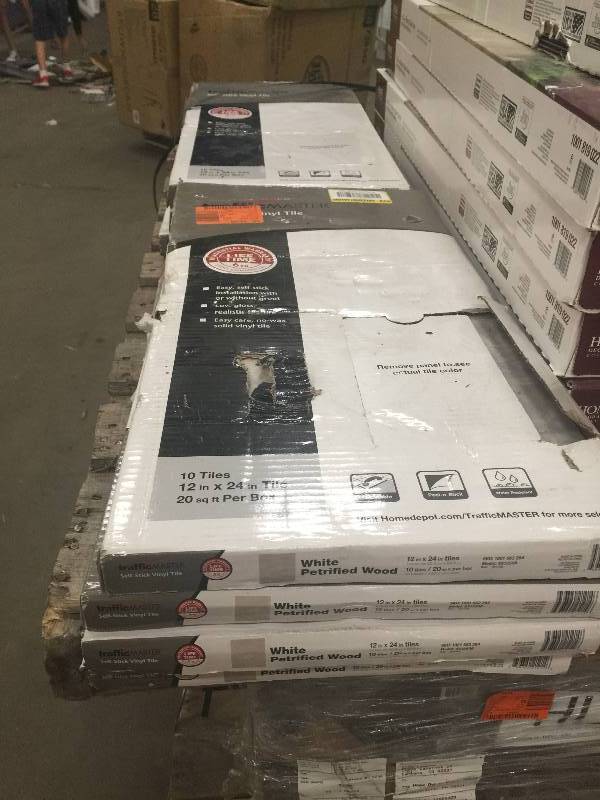 lot 9 image: TrafficMASTER 12 in. x 24 in. Peel and Stick White Petrified Wood Vinyl Tile (20 sq. ft.  case) 8 cases open box never used Model # SS1214