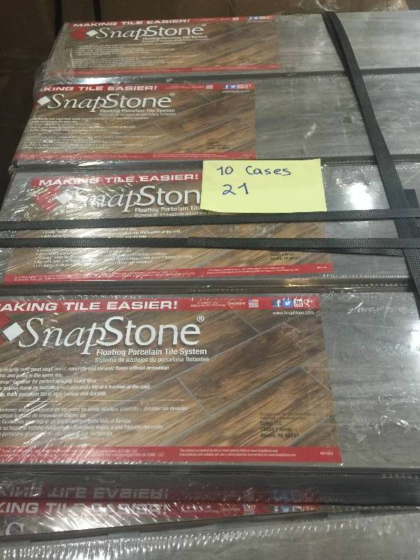 lot 21 image: SnapStone Weathered Grey 6 in. x 24 in. Porcelain Floor Tile (5 sq. ft.  case)  10 cases Model # 11-034-06-02 open box never used