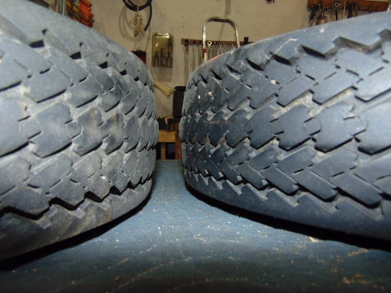 lot 59 image: (2) 5.70 - 8 Trailer Tires and 4 Bolt Rim