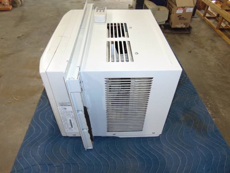 lot 63 image: Air Conditioner Unit With Remote