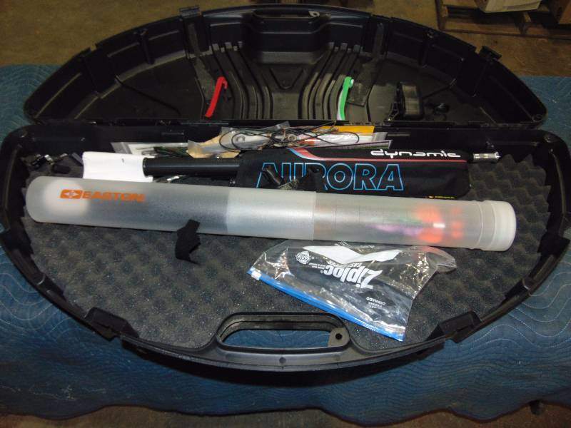 lot 76 image: Compound Bow Hard Case With Arrows and Accessories