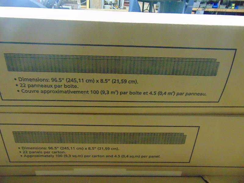 lot 118 image: (4) Boxes of 8 Cedar Shake Siding