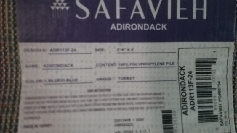 lot 35 image: Safavieh Area Rug