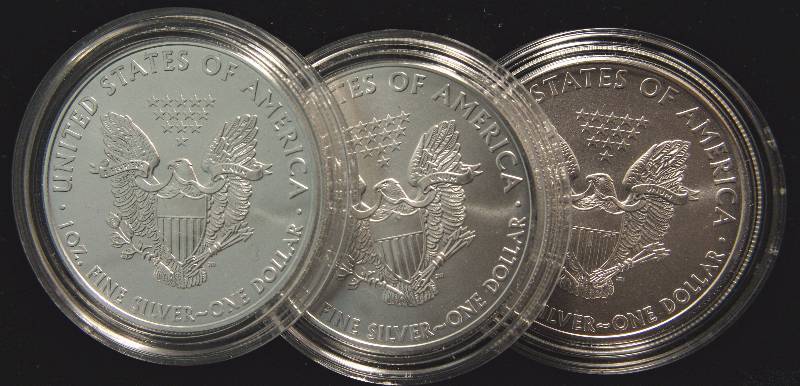 GROUP OF 3 SILVER AMERICAN EAGLES IN AIRTITE HOLDERS  2008 X 3