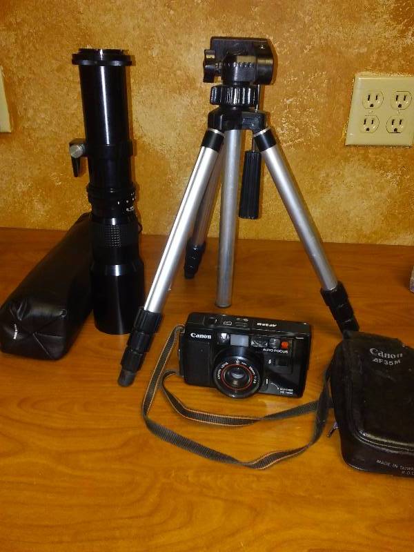 lot 100 image: Cannon AF35M Camera, Telescopic Kalimar lens, Tripod, Bag
