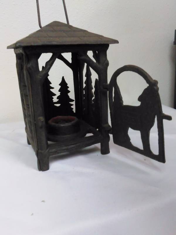 lot 12 image: Cast Iron Candle Lantern