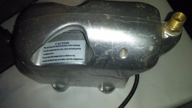 lot 69 image: Outdoor Lot Portable Air Compressor (tested and works) and more