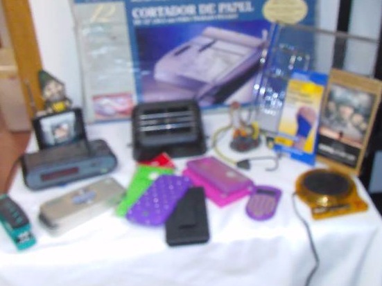 lot 81 image: Heavy duty paper cutter.AMFM Radio (look like Old School TV) plus more