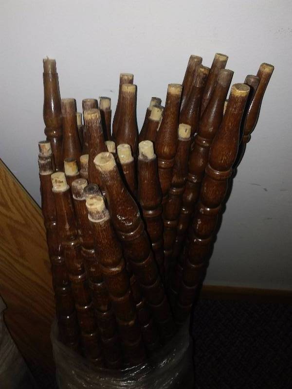 lot 109 image: Wood Spindles (32) and Armstrong Laminate Flooring