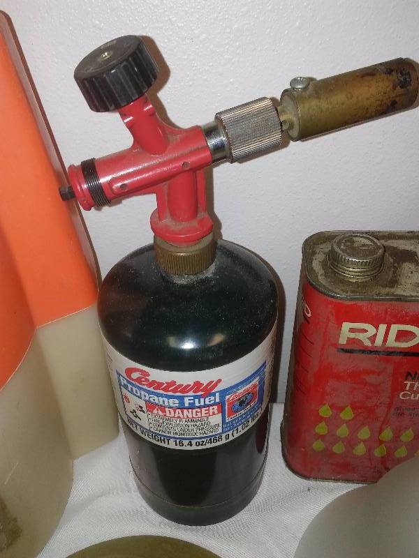 lot 136 image: Plano Troll Minnow Bucket, Propane Torch, Thread Cutting Oil, and Light Replacement Shades (8)