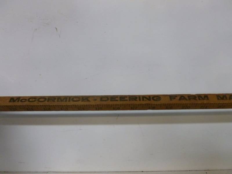 lot 54 image: Vintage International Harvester Yardstick