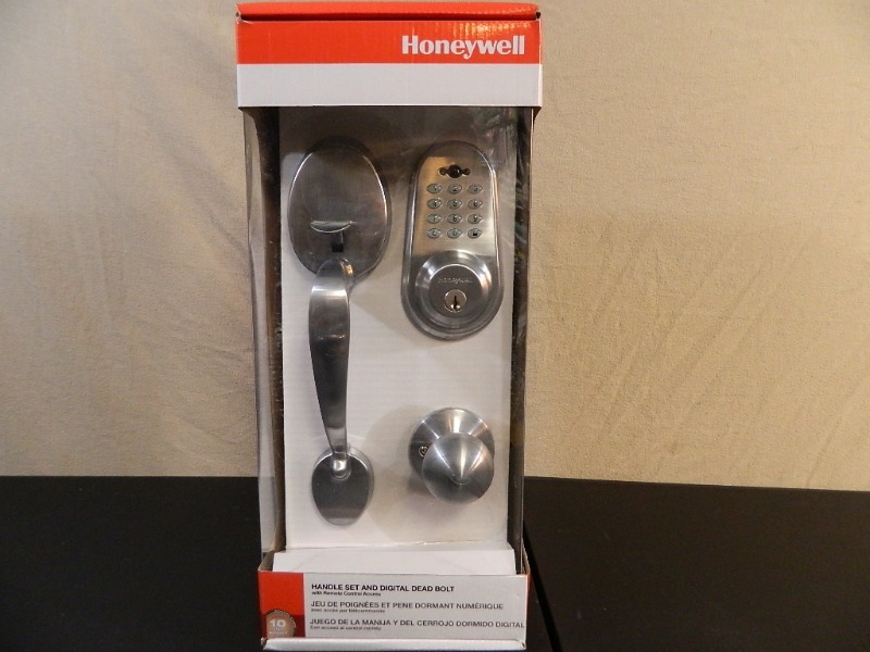 lot 21 image: New Honeywell Handle Set and Digital Deadbolt with Remote Control