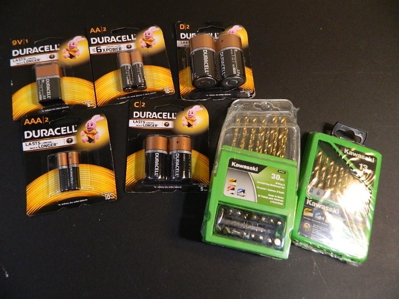 lot 194 image: New Duracell Batteries and New Drill Bits