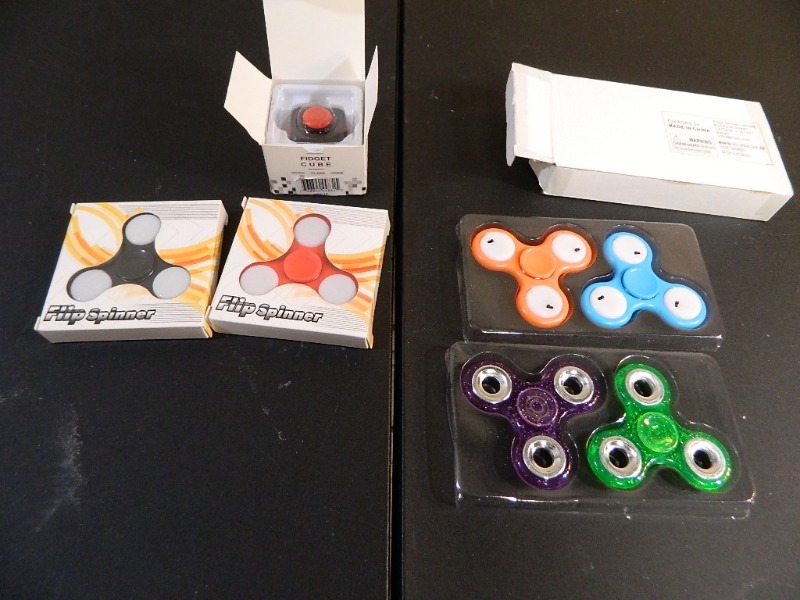 lot 209 image: New Fidget Spinners and Cube Spinner