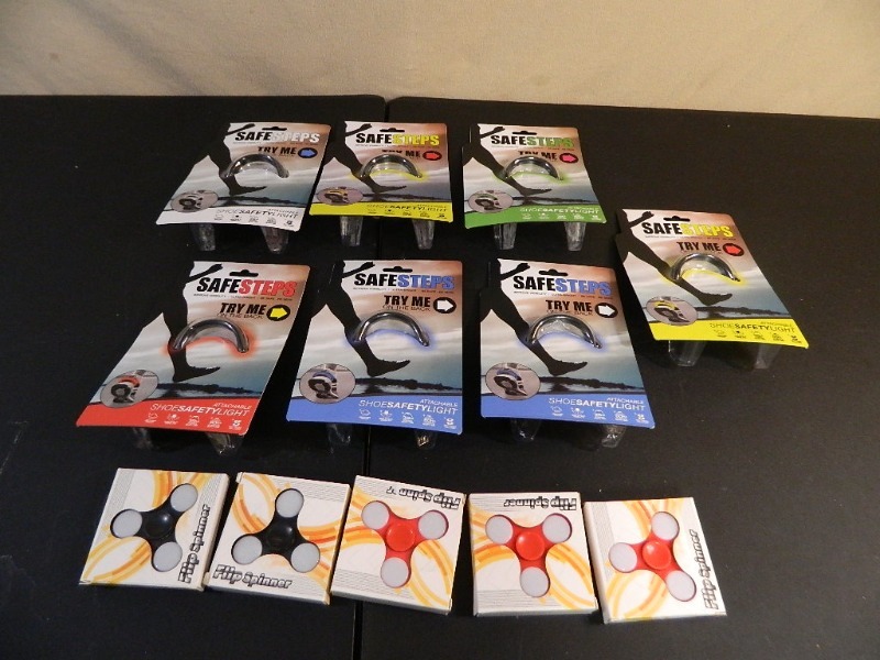 lot 212 image: 7 New Safety Lights and 5 LED Fidget Spinners