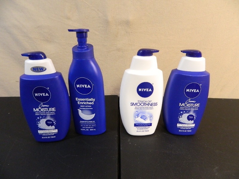 lot 216 image: 4 New Bottles of Nivea Lotion