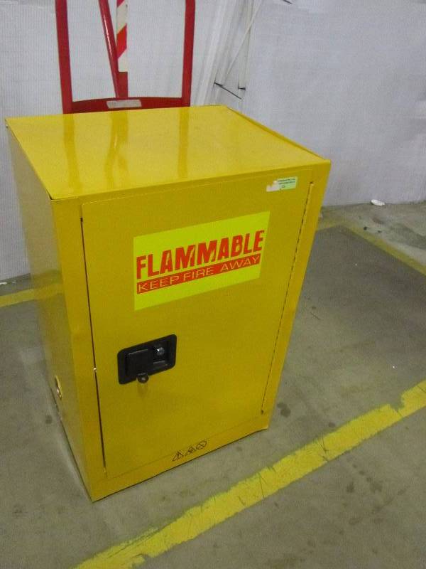 lot 49 image: Edsal 35 in. H x 23 in.W x 18 in. D Steel Freestanding Flammable Liquid Safety Single-Door Storage Cabinet in Yellow