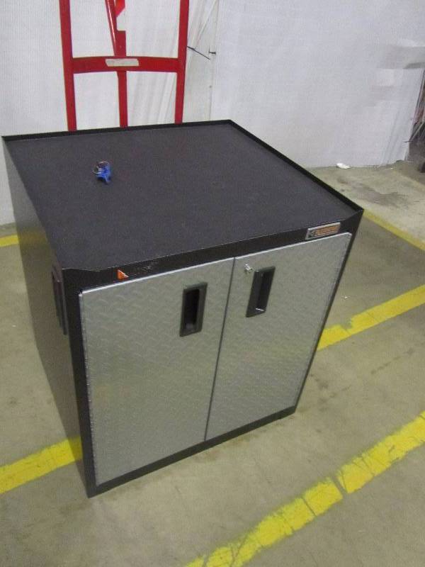 lot 50 image: Gladiator Premier Series Pre-Assembled 35 in. H x 28 in. W x 25 in. D Steel 2-Door Rolling Garage Cabinet in Silver Tread