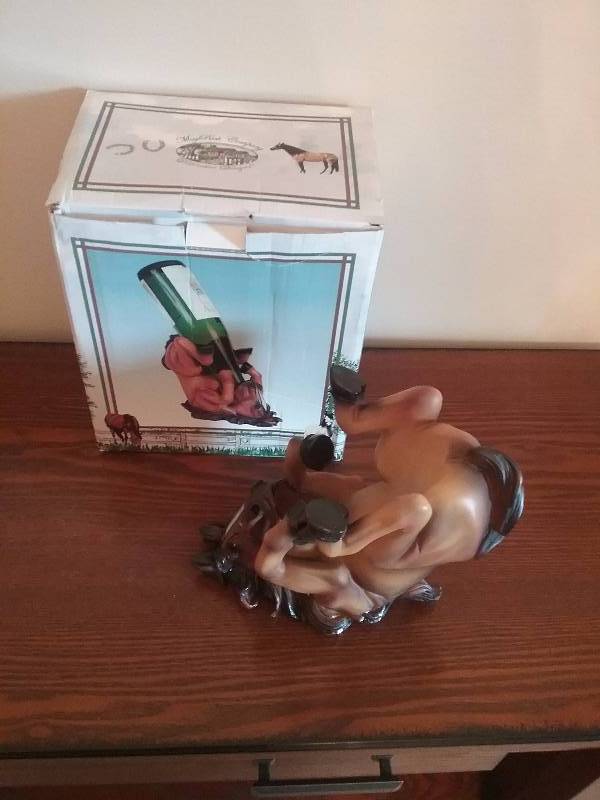 lot 130 image: Resin Horse Bottle Holder