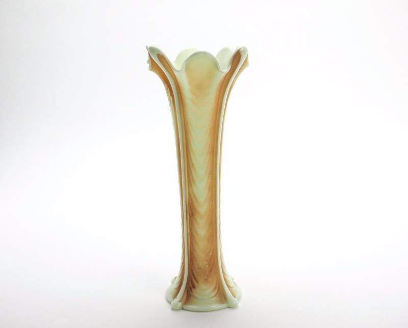 lot 38 image: Northwood Custard Glass Drapery Footed Variant Vase with Nutmeg Stain