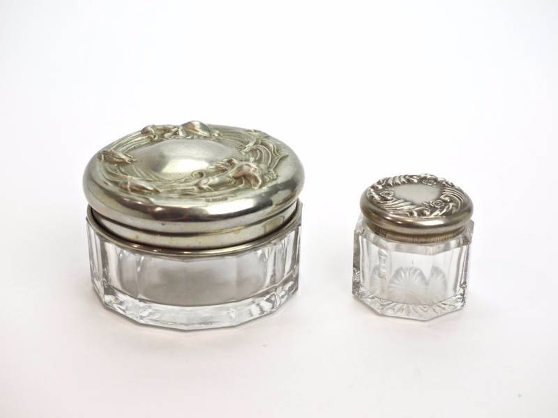 lot 48 image: Two Art Nouveau Silver Repousse covered Jars