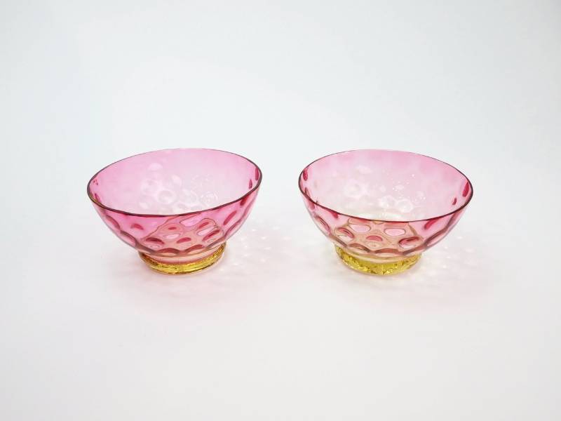 lot 91 image: Two Inverted Thumbprint CranberryAmberina bowls