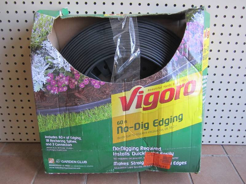 lot 10 image: Vigoro 60ft No-Dig Edging Open box....