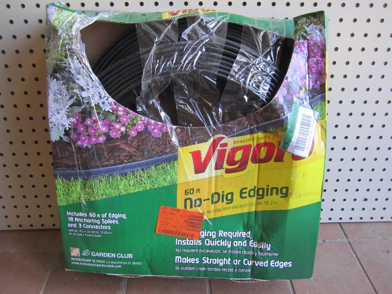 lot 11 image: Vigoro 60ft No-Dig Edging Open box....