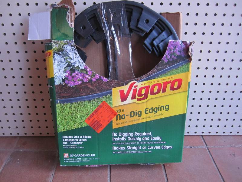 lot 13 image: Vigoro 20ft No-Dig Edging Open box....