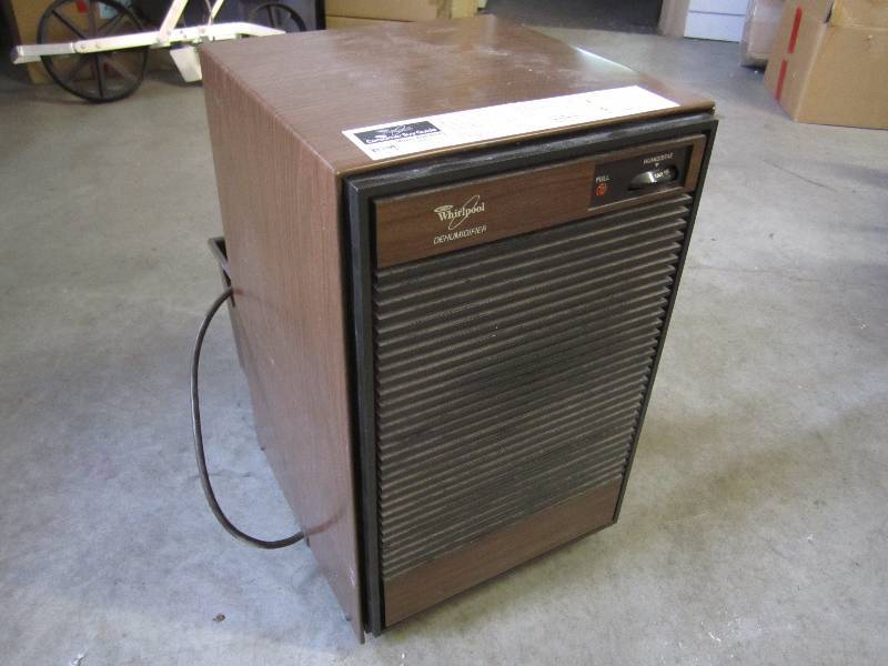 lot 100 image: Whirlpool Dehumidifier Powers on an...