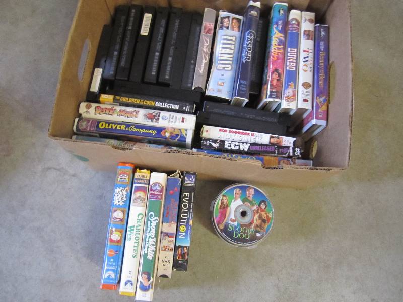 lot 134 image: Large lot of DVD and VHS Movies and...