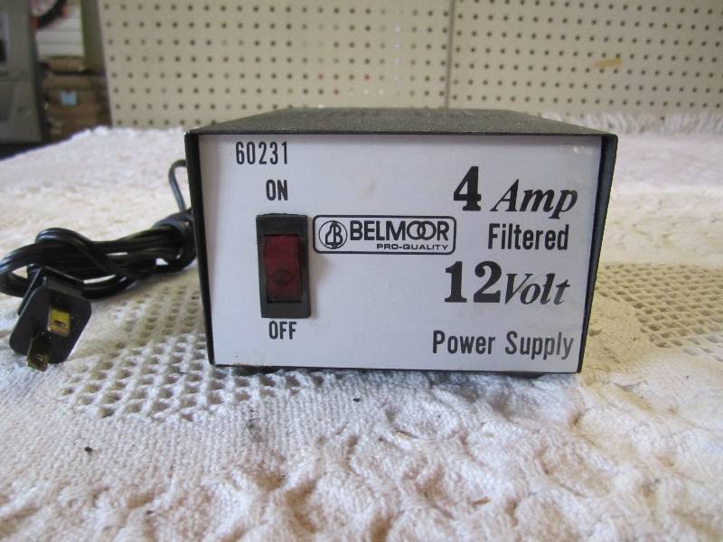 lot 171 image: Belmore Pro Quality 4 Amp Filtered ...