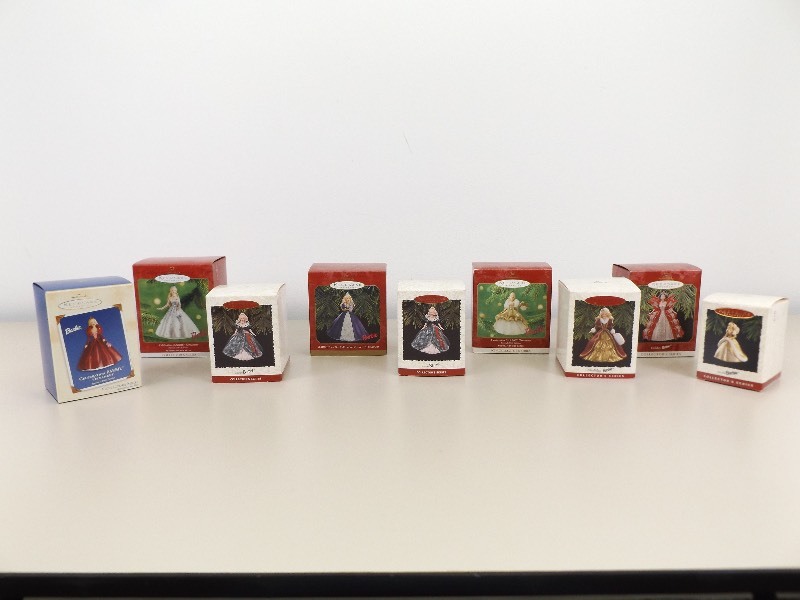 lot 26 image: 9 New in Box Vintage Hallmark Keepsake Barbie Ornaments