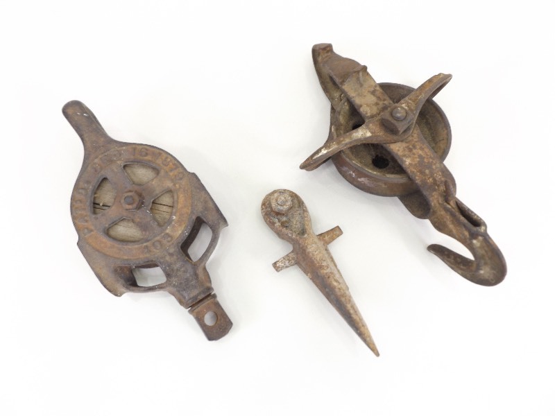 lot 36 image: Antique Iron Barn Pulleys