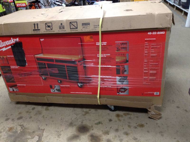 Milwaukee 60 in. 11-Drawer and 1-Door 22 in. D Mobile Workbench with Adjustable-Height, Sliding Pegboard Back Wall, Red and Black not used
