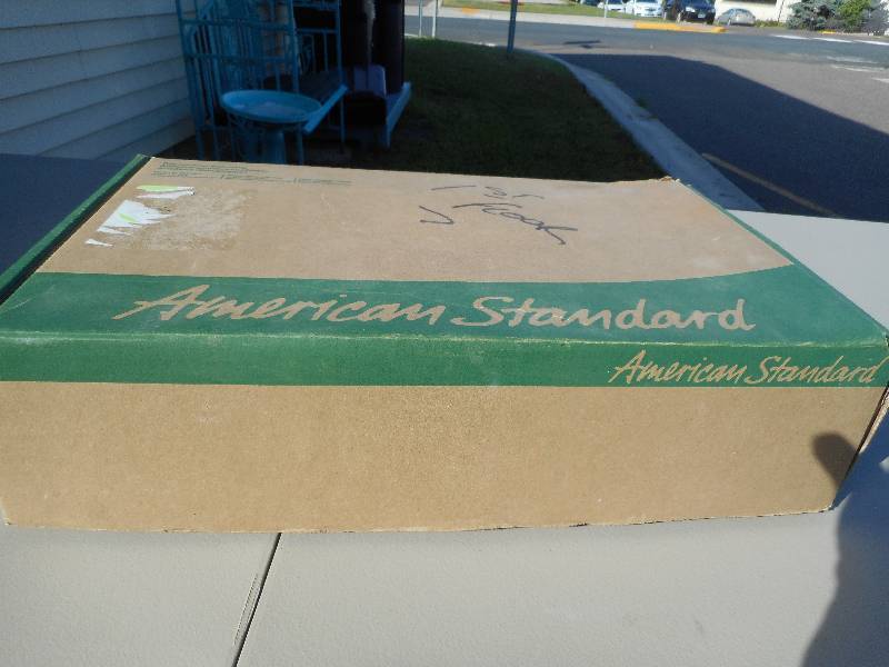 lot 1 image: American Standard Heritage Faucet