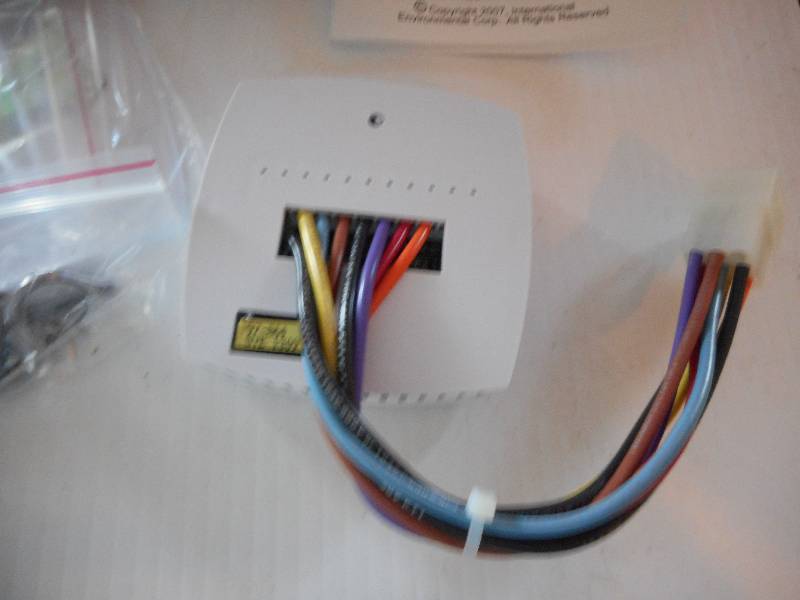 lot 128 image: IEC International Environmental 7 Day Programmable Thermostat