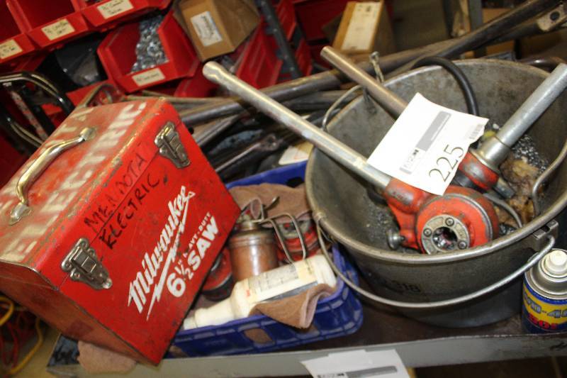 lot 225 image: Ridgid Pipe Stand, Milwaukee Tools 6.5in. Heavy Duty Saw w Case, Other Pipe Couplings & Related Parts