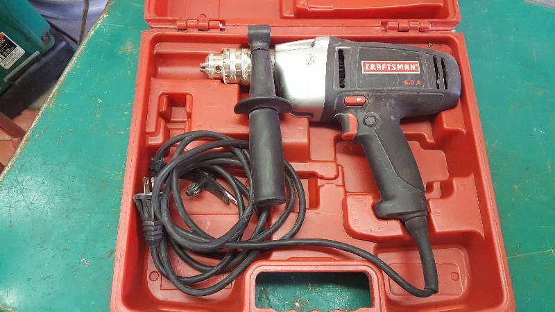 lot 320 image: Craftsmen 12 Corded Electric Drill in Case Key Chuck