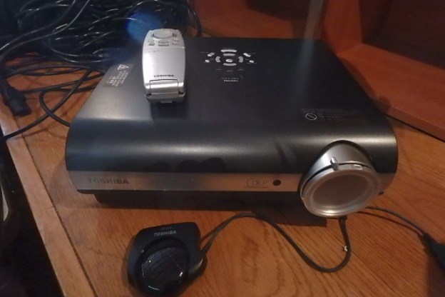 lot 62 image: Toshiba TDP-T45 Projector w Wheeled Case