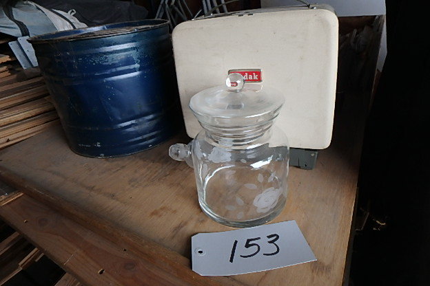 lot 153 image: Glass Jar, Projector, Old Metal Cans, Old Case