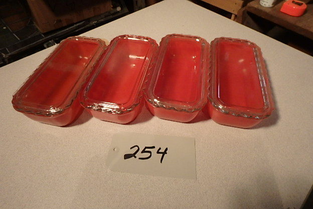 lot 254 image: 4 Orange Refridgerator dishes