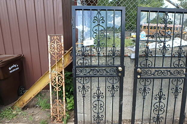 lot 390 image: Wrought Iron Storm Door