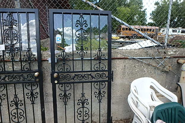 lot 391 image: Wrought Iron Storm Door