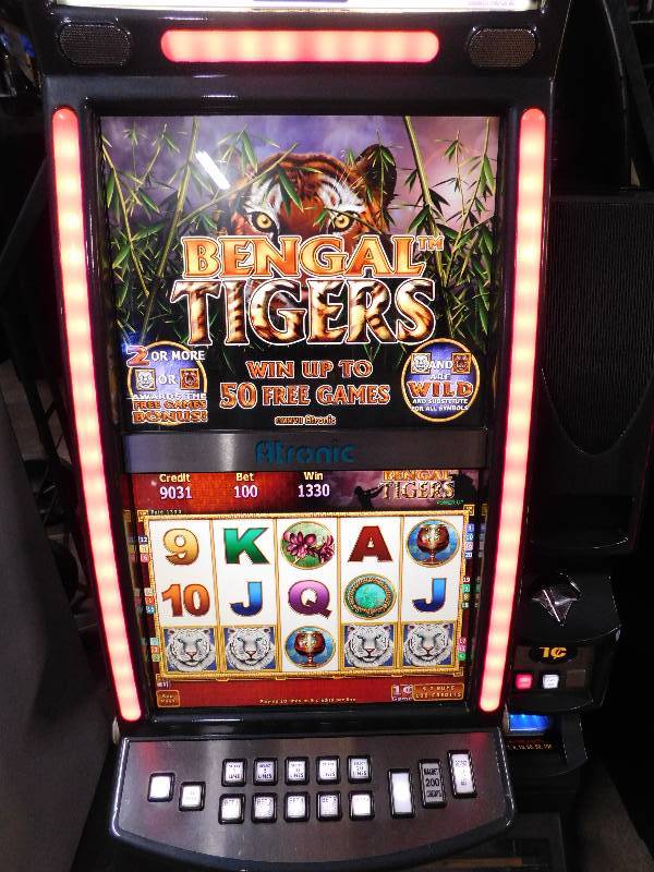 lot 1003 image: ATRONIC BENGAL TIGERS SLOT MACHINE