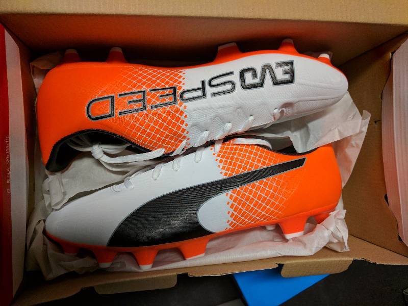 Puma Men�s Evospeed 4.5 Tricks FG Cleated Soccer Shoe White-Orange - 9