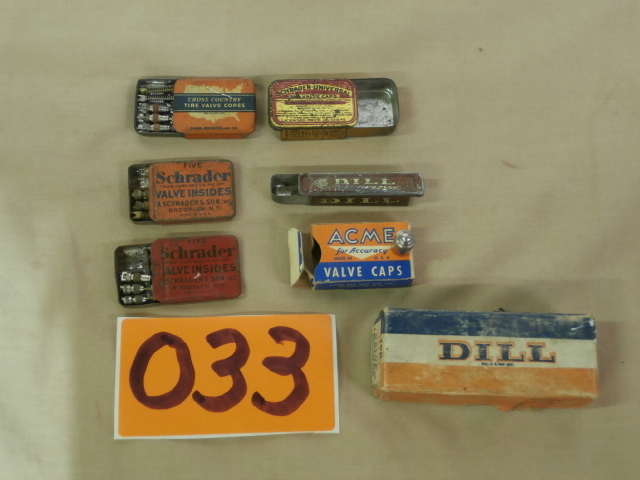lot 33 image: Group of Vintage Automotive Tire Valve Insides, Tins & Boxes