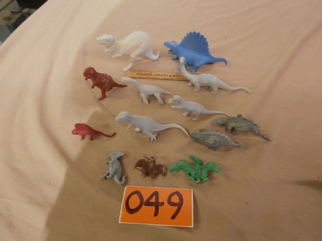 lot 49 image: Group of Plastic Dinosaur Figures