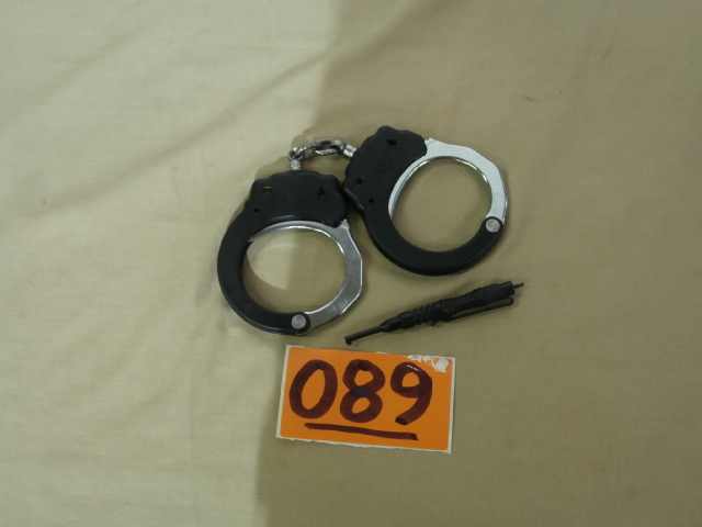 lot 89 image: Pair of Regulation JSV Handcuffs & Key