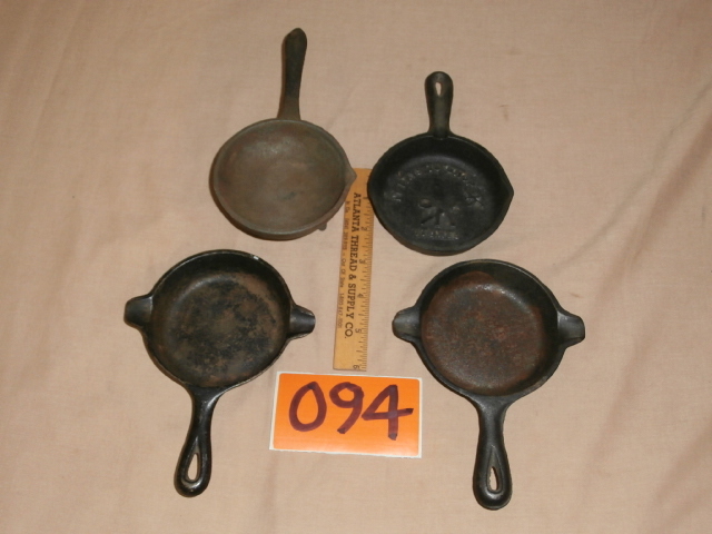 lot 94 image: Four Vintage Cast Iron Fry Pan Ashtrays